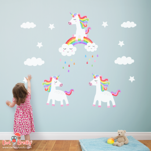 3 rainbow unicorn wall sticker decals, ideal for a feature wall or over a bed. Featuring 3 different white and coloured unicorns, clouds and stars. Also available in other colours